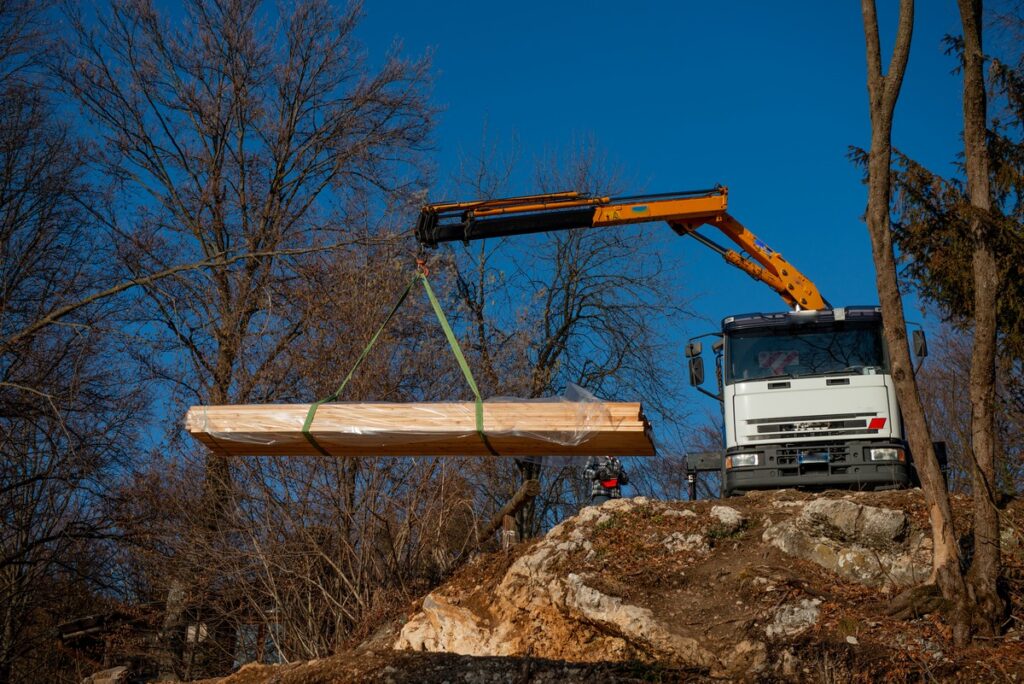 Unloading goods from the truck with a crane